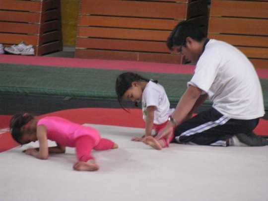 Girls practicing their splits